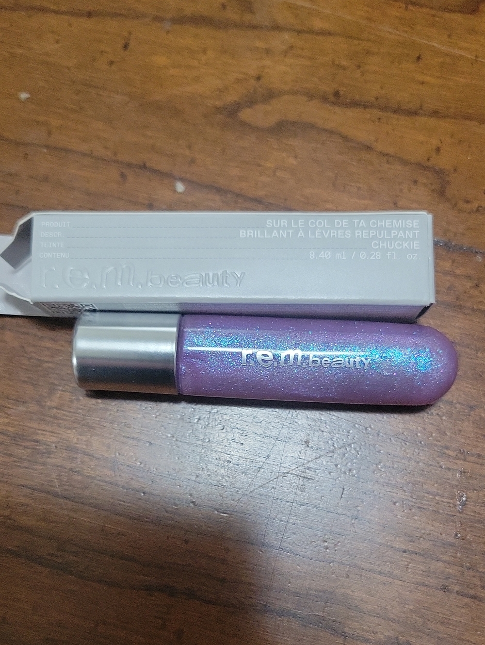 plumping Iridescent Purple Lip Gloss - Chuckie